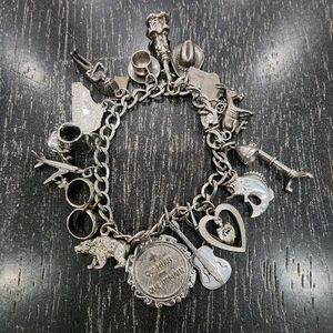 Vintage stamped Sterling Silver Full Loaded Charm Bracelet 15 charms